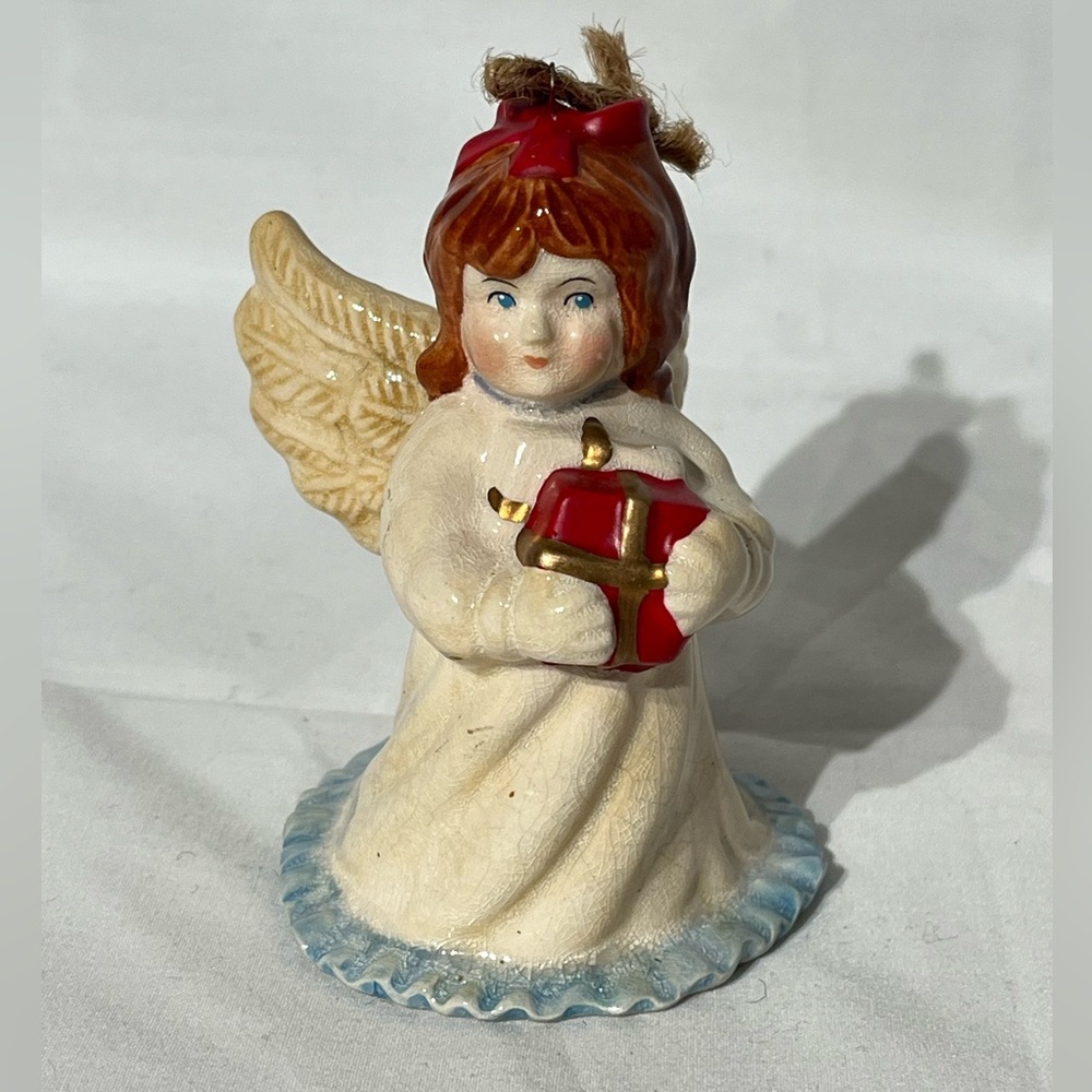 Vintage Hand Painted Porcelain Christmas Angel Cherub Ornament Holding a Gift